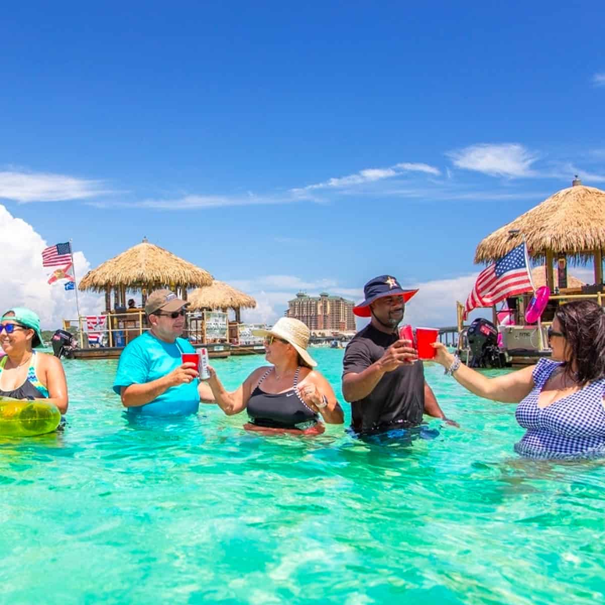 Cruisin' Tikis floating tiki boat cruising through Destin Harbor