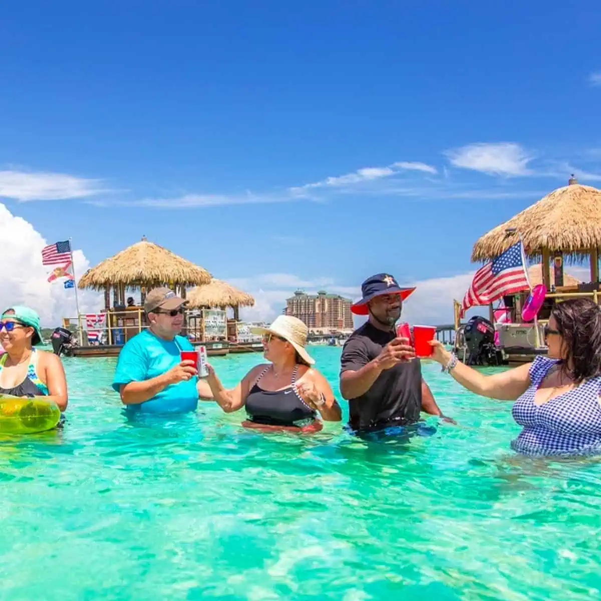 Cruisin' Tikis floating tiki boat cruising through Destin Harbor