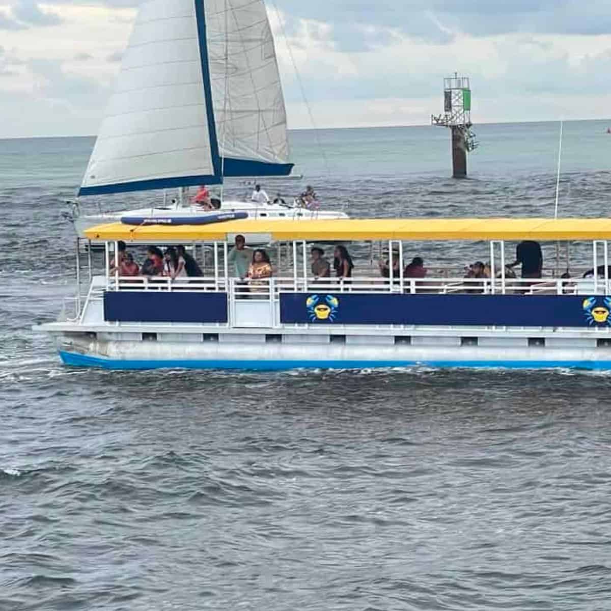 Happy Watersports tour boat ready for a scenic coastal adventure