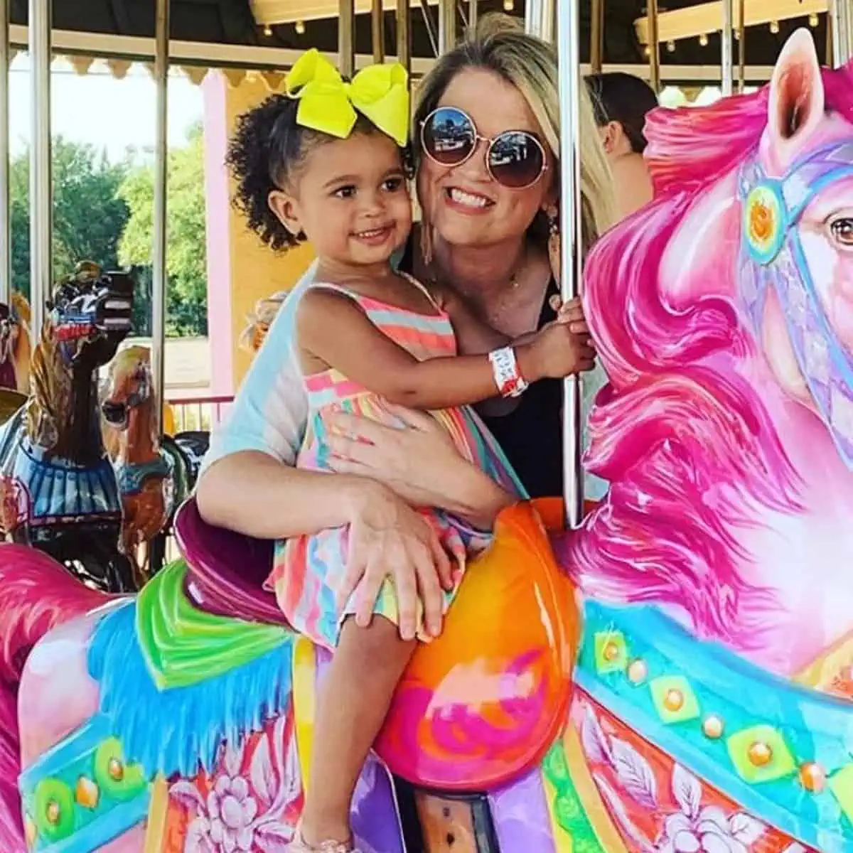 Guests enjoying roller coasters and family rides at Family Kingdom