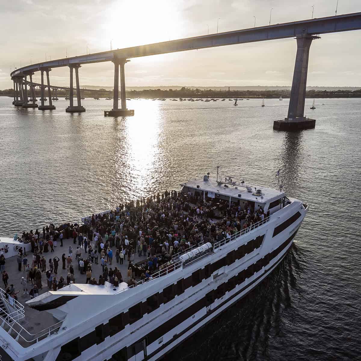 Passengers enjoying a sightseeing cruise with Flagship Cruises on San Diego Bayv