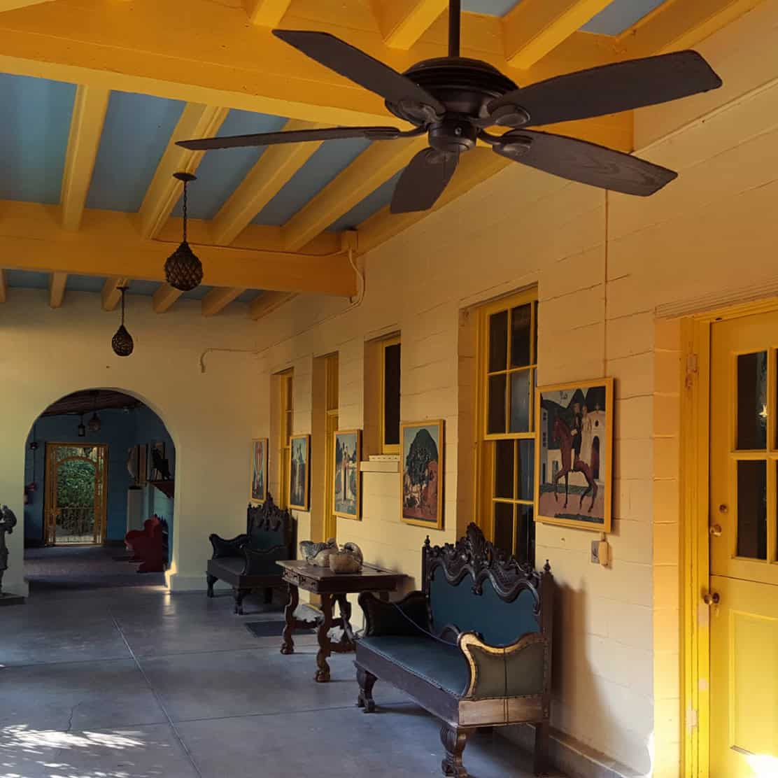 Guests walking through the scenic pathways at Bonnet House Museum & Gardens in Fort Lauderdale