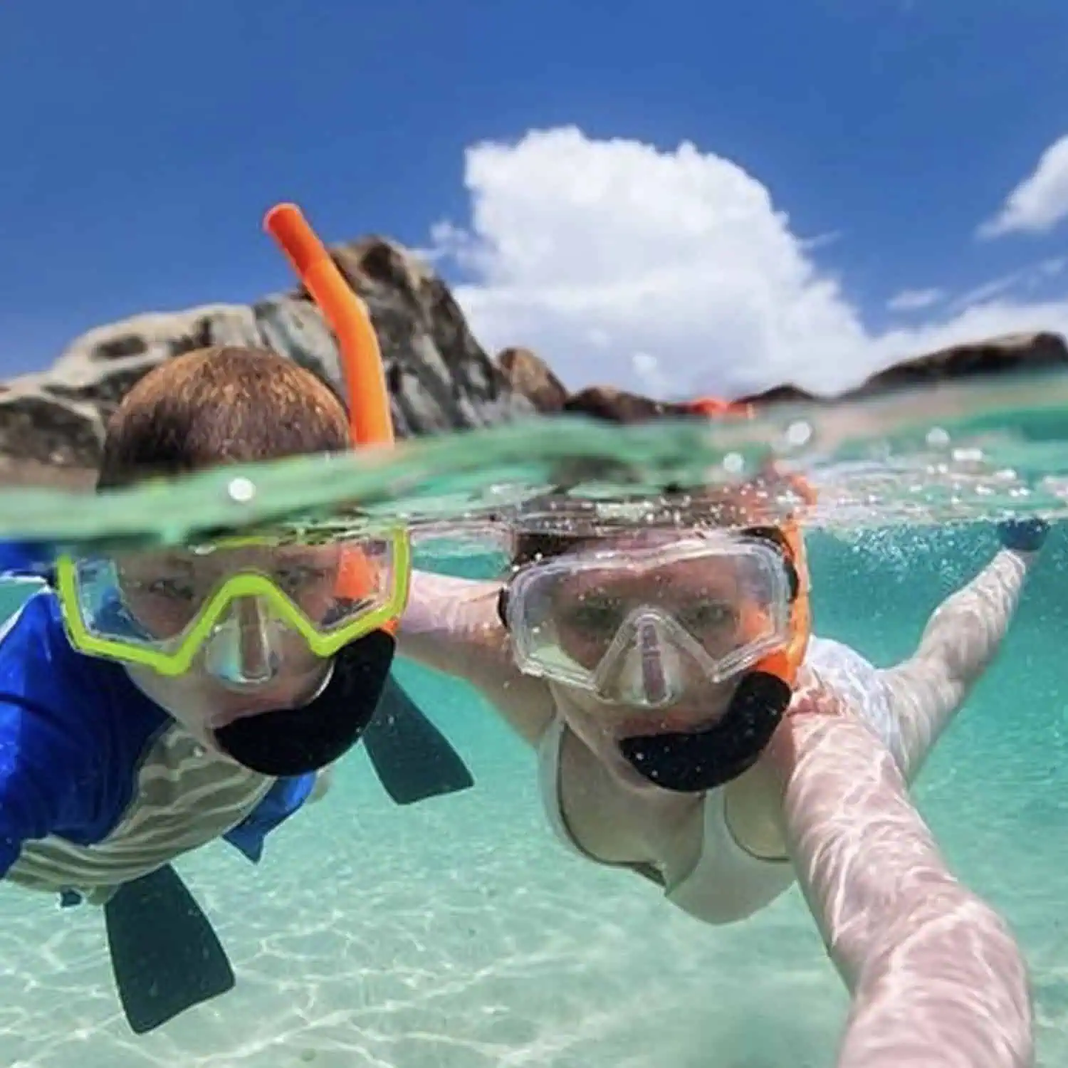 Passengers discovering colorful marine life on the Midday Snorkel Tour from Margaritaville Resort