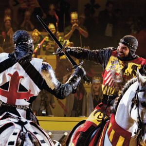 Armored knights competing in a live jousting tournament at Medieval Times Scottsdale