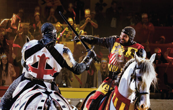 Armored knights competing in a live jousting tournament at Medieval Times Scottsdale